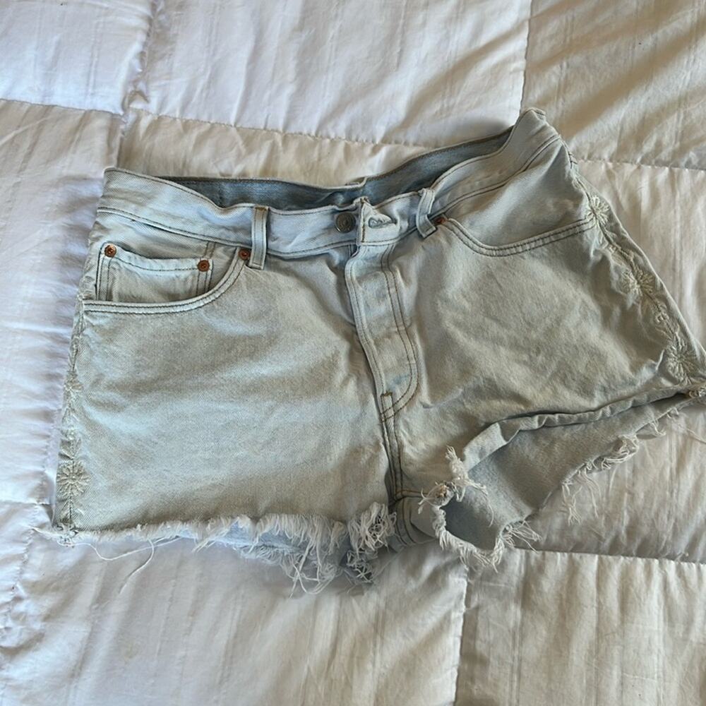 Levi's 501 cut off denim shorts with floral embroidery.  Size 34 (?)